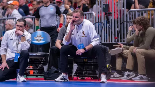 Head coach Mark Branch coaches during the NCAA Championships in Cleveland, Ohio