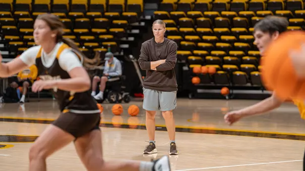 Head Coach Heather Ezell watches first official practice of the year