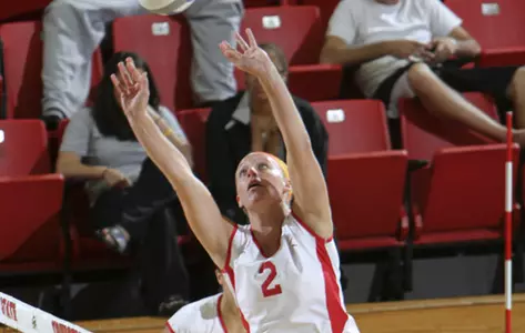 Dani Soubliere sets a volleyball