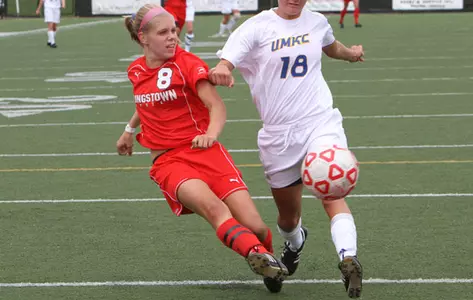 Allison Ludwig kicks a soccer ball