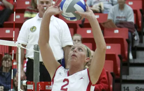 Dani Soubliere sets a volleyball