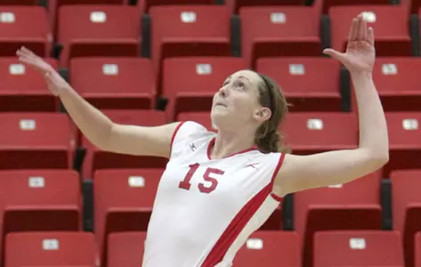 Tasha Reid prepares to hit a volleyball