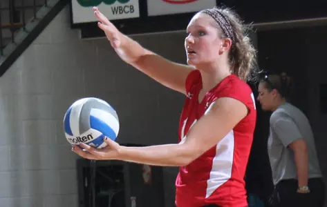Missy Hundelt prepares to serve