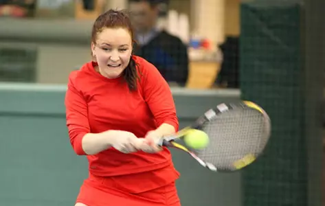 Margarita Sandovnikova hits a backhand shot