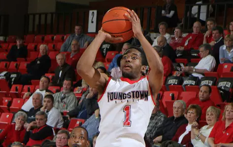 Blake Allen shoots a basketball