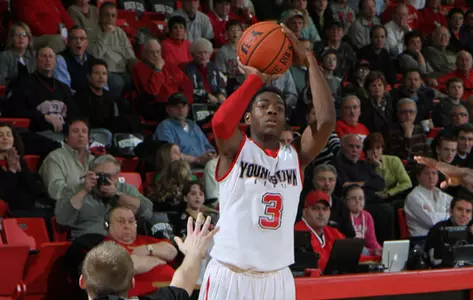Kendrick Perry shoots a basketball