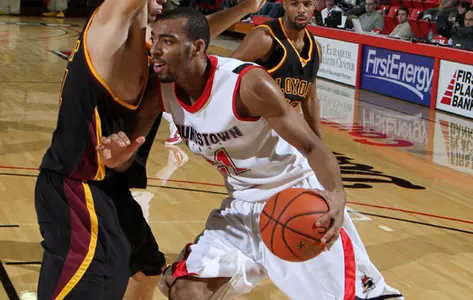 Damian Eargle drives against a defender