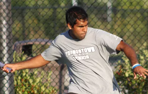 Tariq Ismail prepares hits a forehand shot