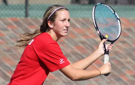 Carolyn Jesko prepares to hit a backhand