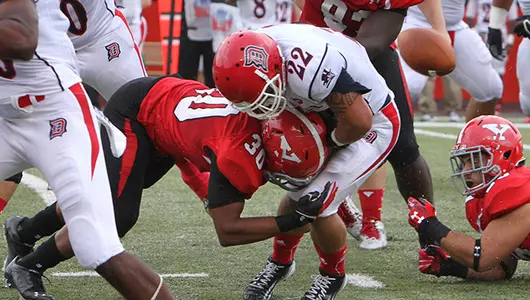 Defense, Hess Lead Football to 59-17 Win Over Duquesne Image