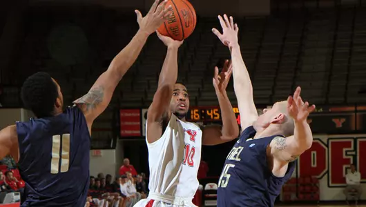 Penguins Win For Sixth Time in Seven Games Beating Thiel, 70-45 Image