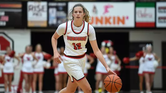 Olson Records Triple-Double, Penguins Roll Past Canisius To Open Season Image