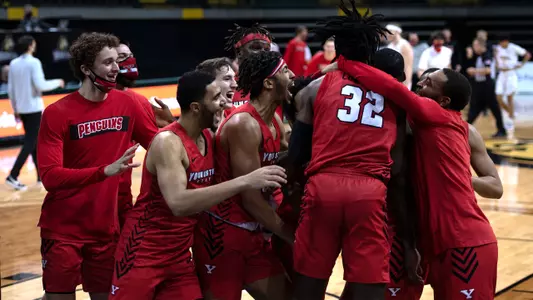 Covington's Buzzer Beater Lifts Penguins to 74-72 Win at Wright State Image