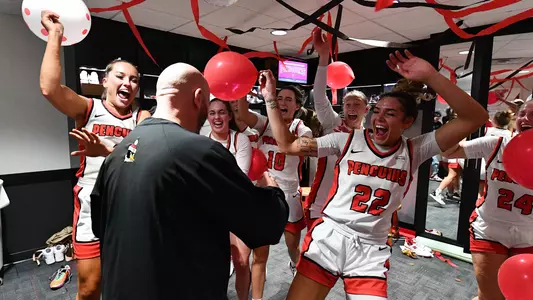 YSU Women's Basketball celebrates its season-opening win over Xavier