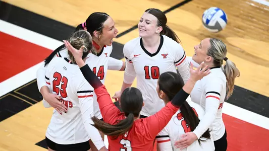 YSU's volleyball team celebrates a point in its 3-0 victory over Milwaukee on Oct. 24, 2025. Photo by Robert Hayes.