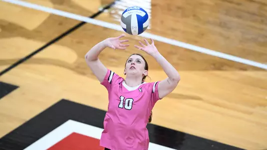 Kameron Blizniak sets a ball in Youngstown State volleyball's annual pink match for breast cancer awareness vs. Northern Kentucky on Oct. 3, 2025. Photo by Robert Hayes