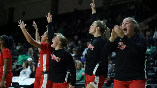 Youngstown State's women's basketball team celebrates a 3-pointer in its game at North Dakota on Nov. 7, 2025.