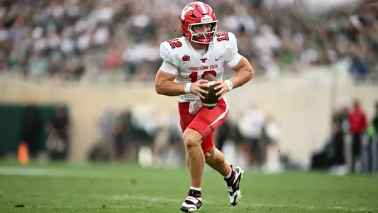 Beau Brungard runs the ball at Michigan State