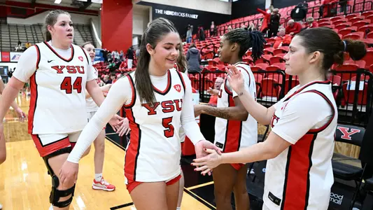Youngstown State's Hayden Barrier high fives teammates after YSU's 97-20 victory over Salem on Dec. 31, 2025. Photo by Robert Hayes.