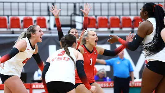Members of the Youngstown State volleyball team celebrate a point in the team's match against Duquesne on Aug. 29, 2025.