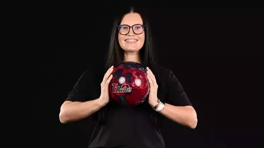 Coach Madyson Marx - 2025-26 Youngstown State bowling photo day in the Stambaugh Stadium Digital Media Studio on Sept. 25, 2025. Photo by Robert Hayes.
