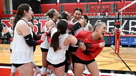 YSU's volleyball team celebrates on the court after sweeping Robert Morris 3-0 on Sept. 30, 2025, at Zidian Family Arena at Beeghly Center. Photo by Robert Morris.