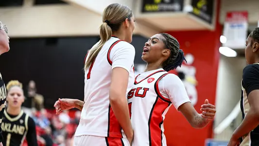 Erica King and Paulina Hernandez celebrate a basket in the Youngstown State women's basketball game vs. Oakland on Jan. 5, 2026. Photo by Robert Hayes.