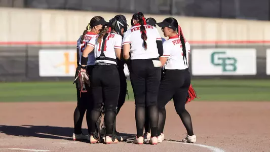 YSU's softball team huddles on the infield during its fall game against Slippery Rock on Sept. 18, 2026.