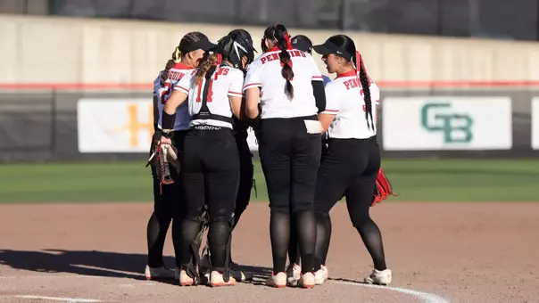 YSU's softball team huddles on the infield during its fall game against Slippery Rock on Sept. 18, 2026.