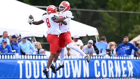 Bryan Hunt and Lynn Wyche-El celebrate a touchdown