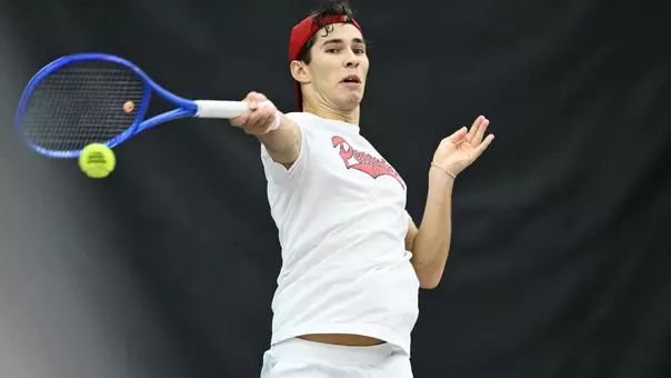 Alex Woiten hits a forehand tennis short at the YSU Invitational