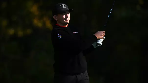 Nolan Shilling watches a tee shot for YSU during the Tom Tontimonia Invitational on Oct. 6, 2026 (Photo by Robert Hayes)