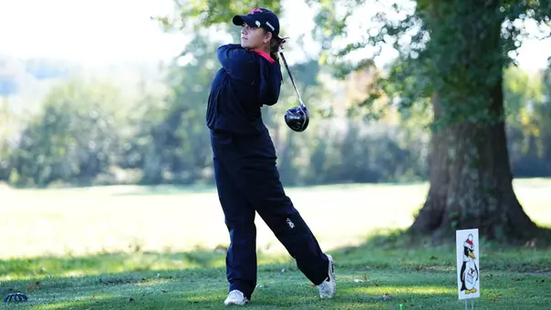 Eliza Mercer watches a tee shot for YSU at the YSU Fall Shootout vs. Mercyhurst on Oct. 4, 2026 (Photo by Drae Smith)