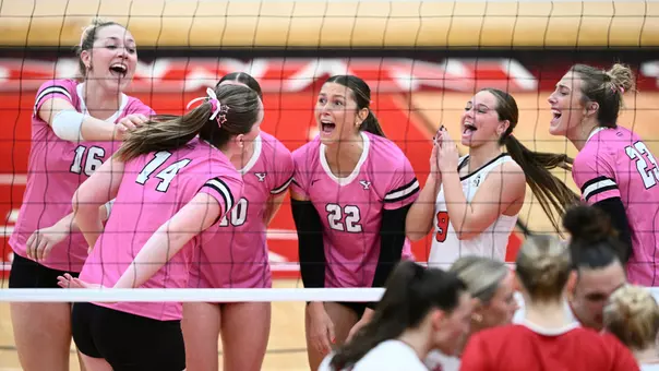 Youngstown State's volleyball team celebrates a point against NIU on Oct. 23, 2026.