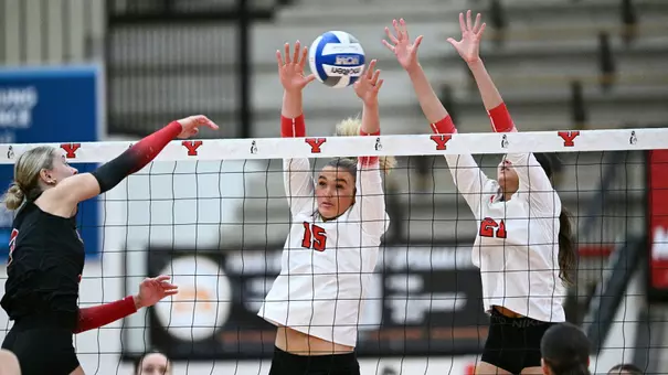 YSU volleyball block at the net vs. NIU