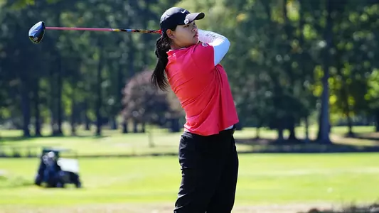 Neeranuch Prajunpanich watches a tee shot for YSU during the YSU Fall Shootout vs. Mercyhurst on Oct. 4, 2026 (Photo by Drae Smith)