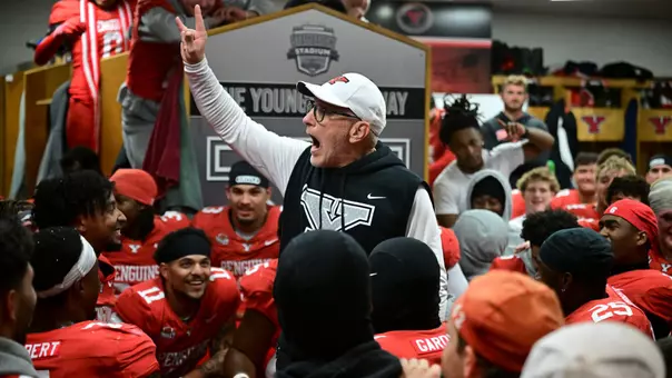 YSU Head Football Coach Doug Phillips celebrates in the locker room following a 31-28 victory over North Dakota on Oct. 31, 2026 (Photo by David Dermer)