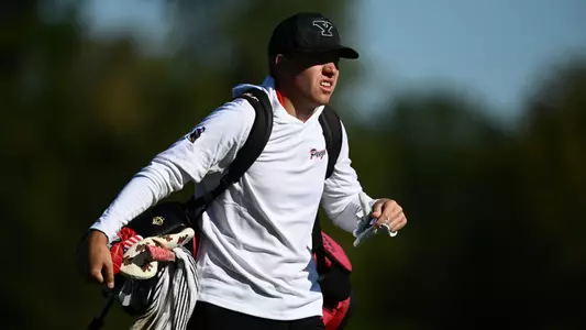 Ryan Sam walks the course for YSU during the Tom Tontimonia Invitational on Oct. 6, 2026 (Photo by Robert Hayes)