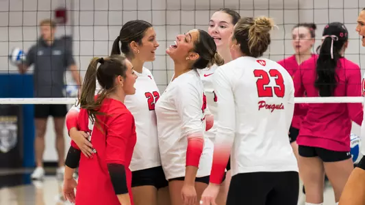 YSU's volleyball team celebrates a point during its four-set win at Purdue Fort Wayne.