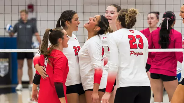 YSU's volleyball team celebrates a point during its four-set win at Purdue Fort Wayne.