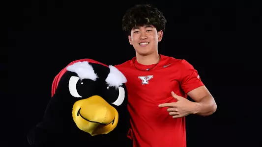Takamasa Mishiro and a Pete the Penguin mascot head