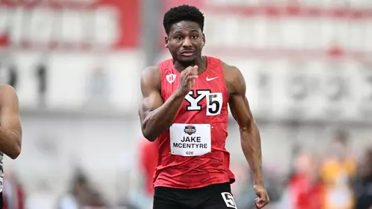 Jake McEntyre runs during the Horizon League finals in the 200m
