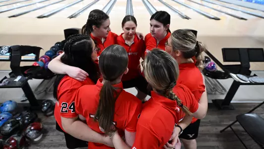 Youngstown State's bowling team huddles before its match against Arkansas State on March 19, 2026, at the Conference USA Championship.