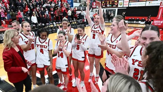 Youngstown State's women's basketball team celebrates its win over Maryland Eastern Shore in the Postseason WNIT.
