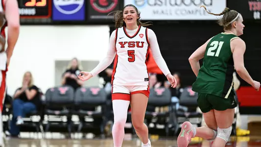 Hayden Barrier celebrates a 3-pointer while going back on defense for Youngstown State in its win over Wright State. Photo by Robert Hayes.