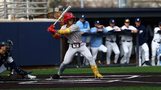 Alex Jang swings a baseball bat