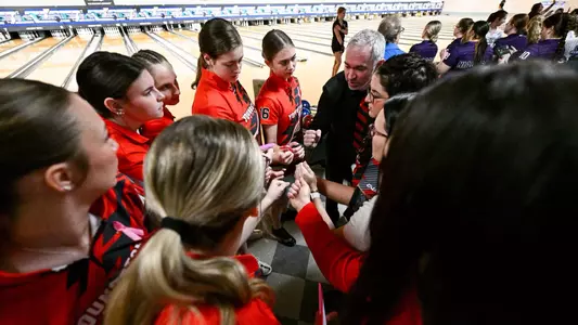 Youngstown State's bowling team huddles at the 2025 Chelsea Gilliam Penguin Classic on Oct. 17, 2025.