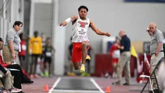 Brayden Green competes in the triple jump
