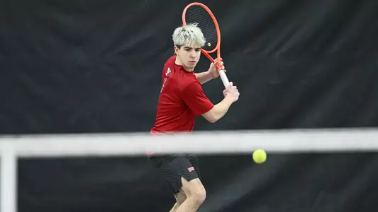 Matteo Ceradelli prepares to return a tennis ball