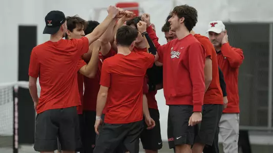 Men's Tennis Huddle prior to a match vs. Duquesne earlier this season.